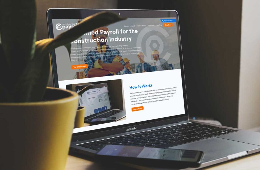 ConstructionPayroll on a laptop screen